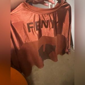 Limited-Edition LVII Cropped Varsity Jersey features a "Fenty X" graphic